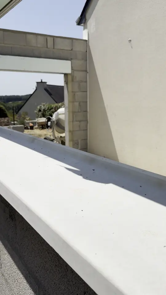 Finition d'une ouverture avec seuil béton lissé, Perrin Maçonnerie